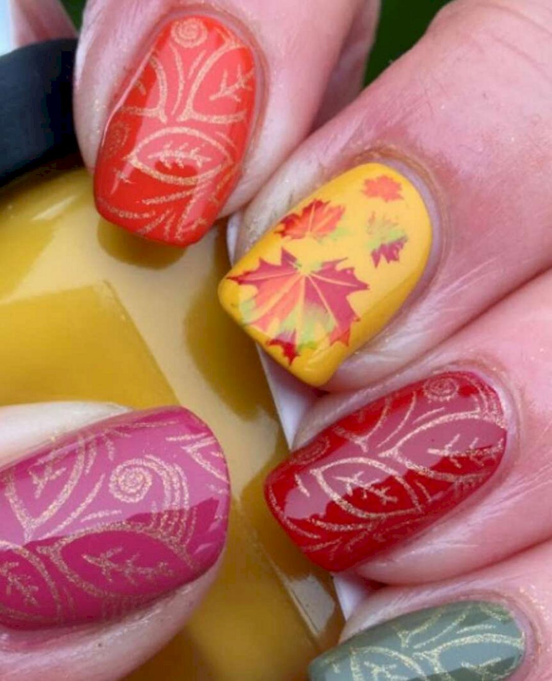 Colorful maple leaf nail art from musely