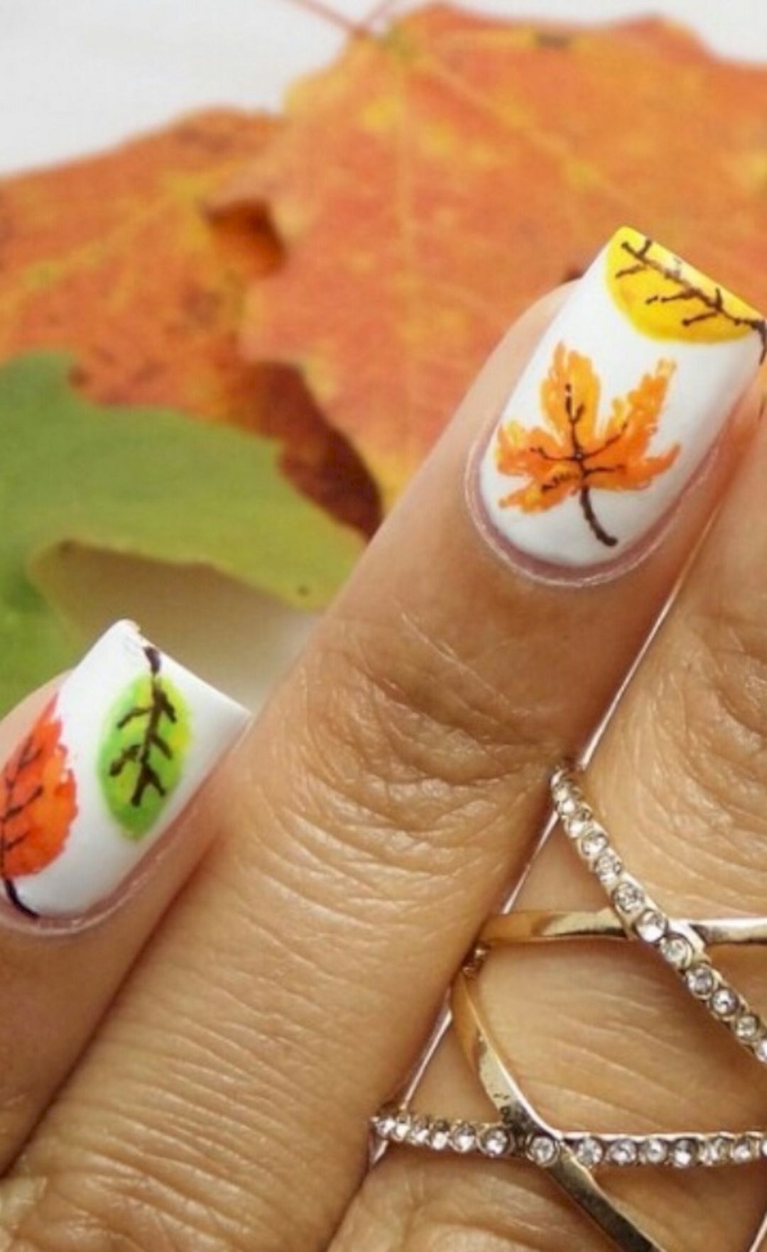 Elegant maple leaf nail art from musely