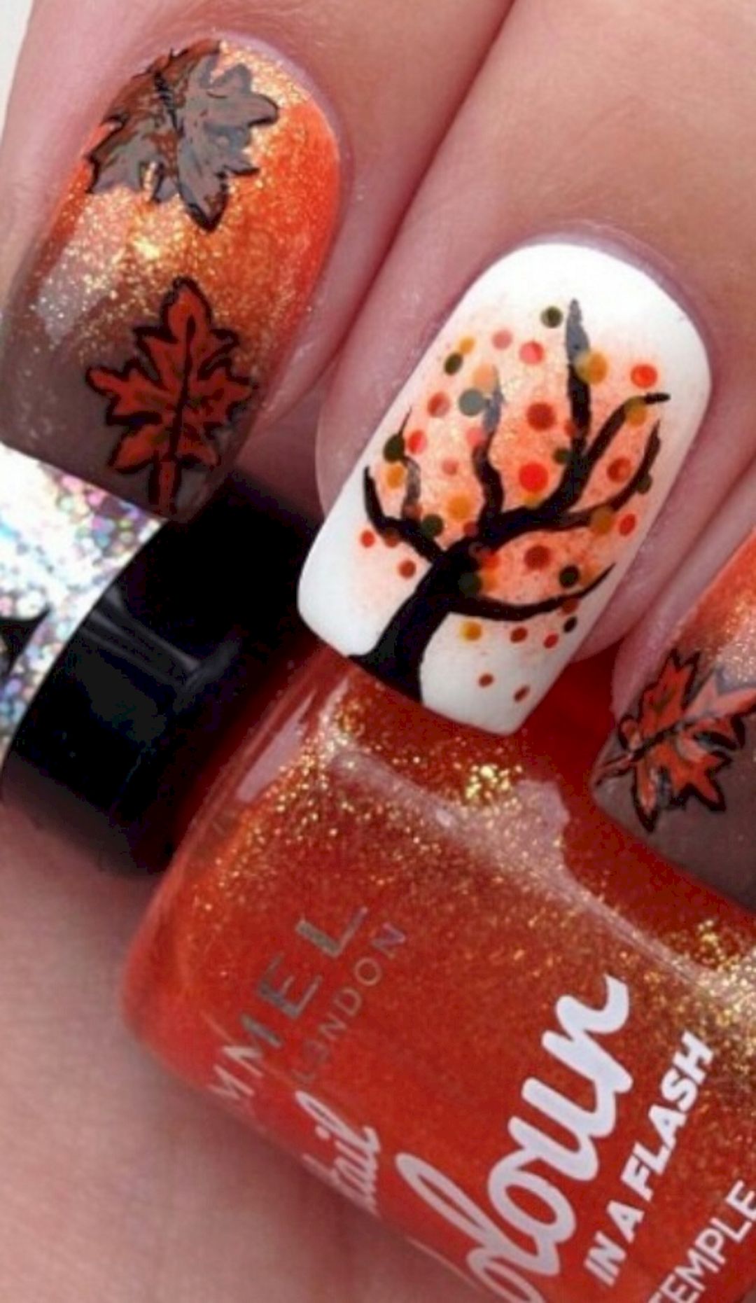 Maple leaf nail art with orange and brown mood from musely