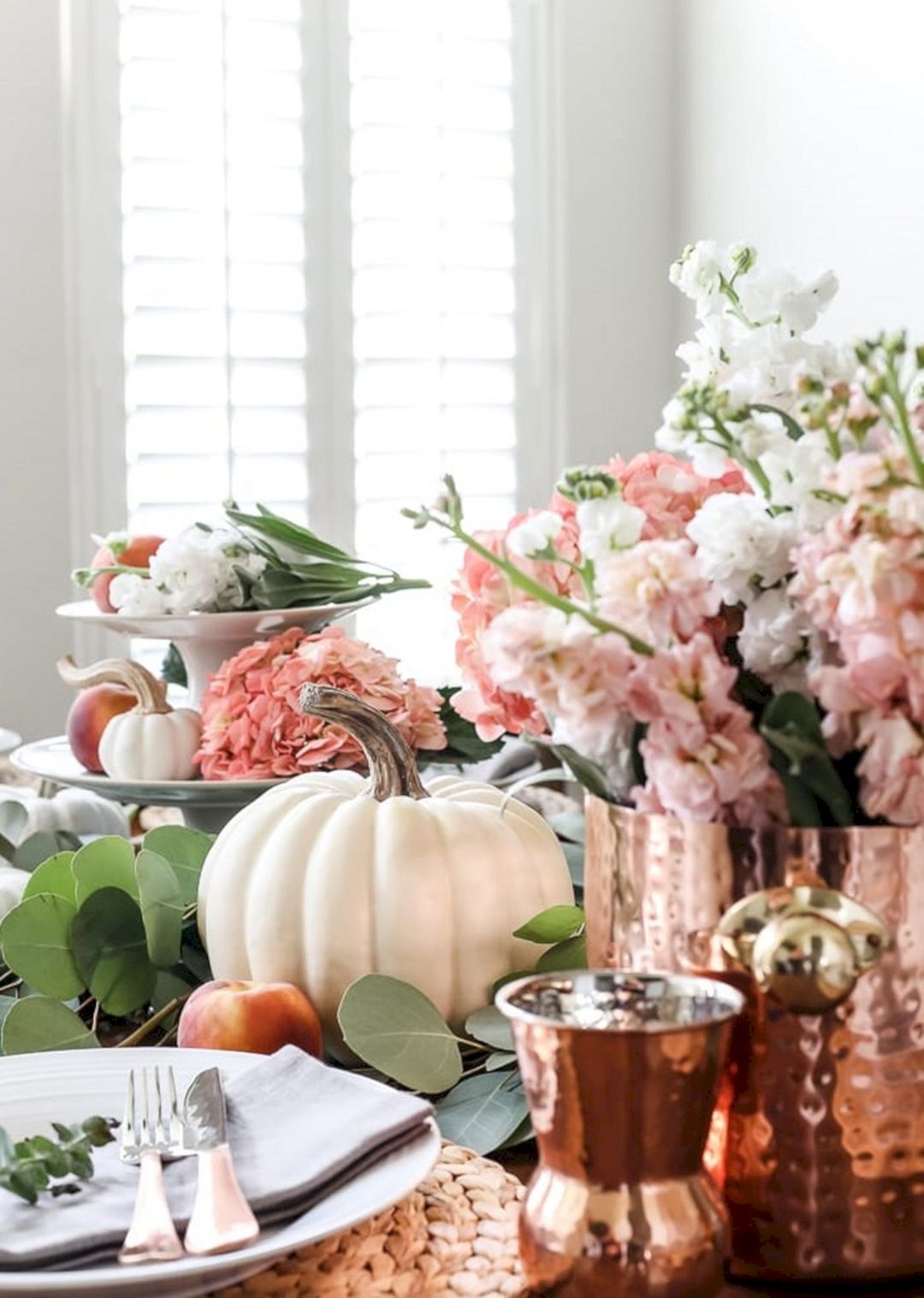 Tablescape with white pumpkins and peaches from maisondepax