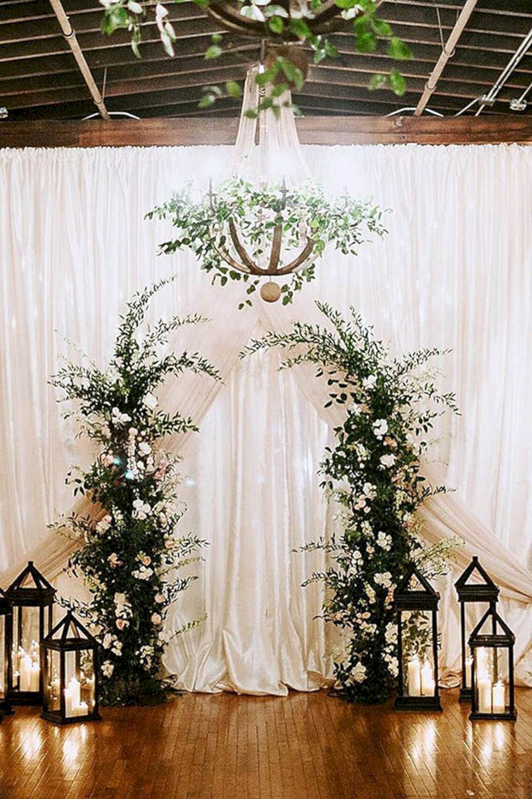 White and greenery altar from elegantweddinginvites