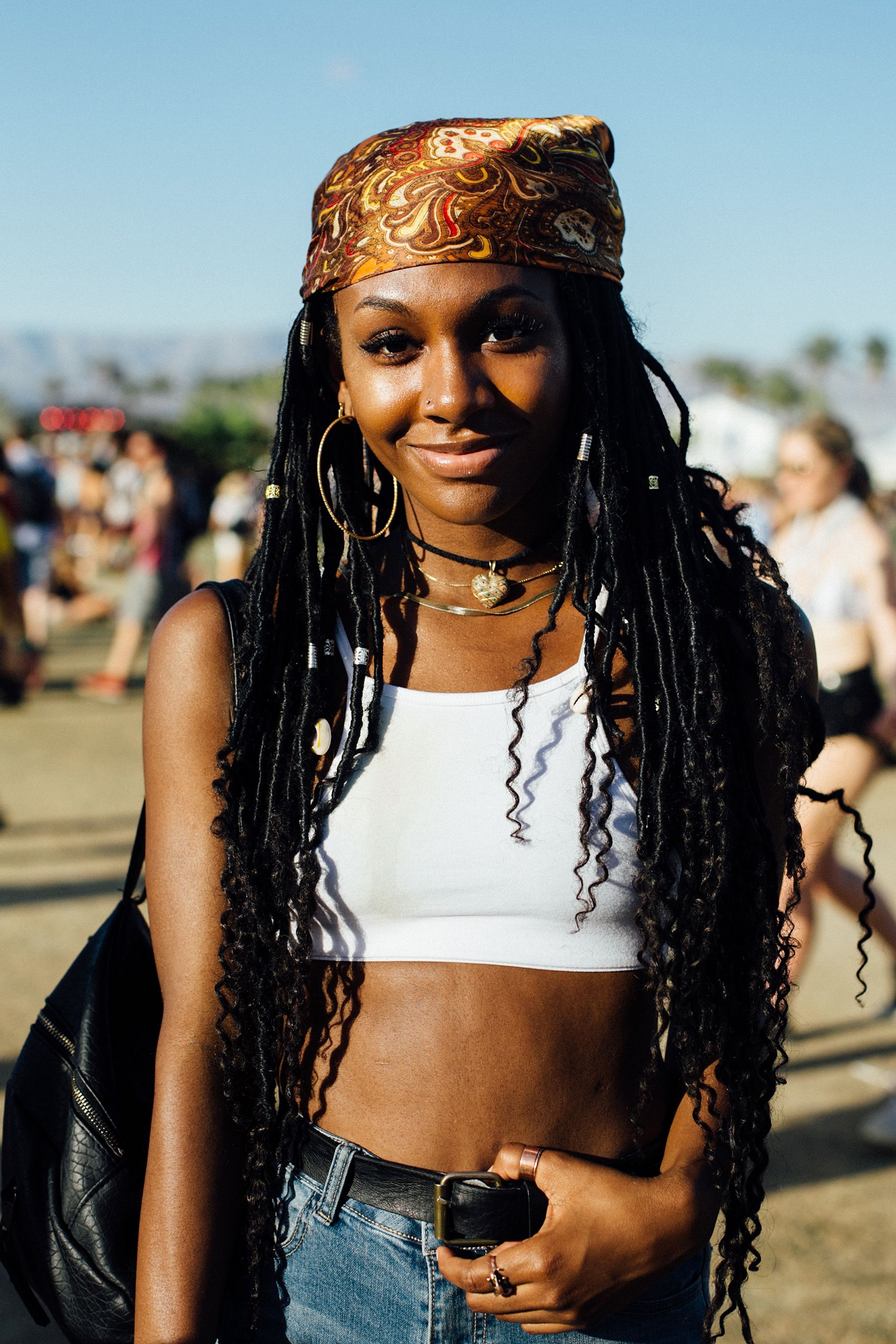 Coachella hair buns of black woman from stylicy
