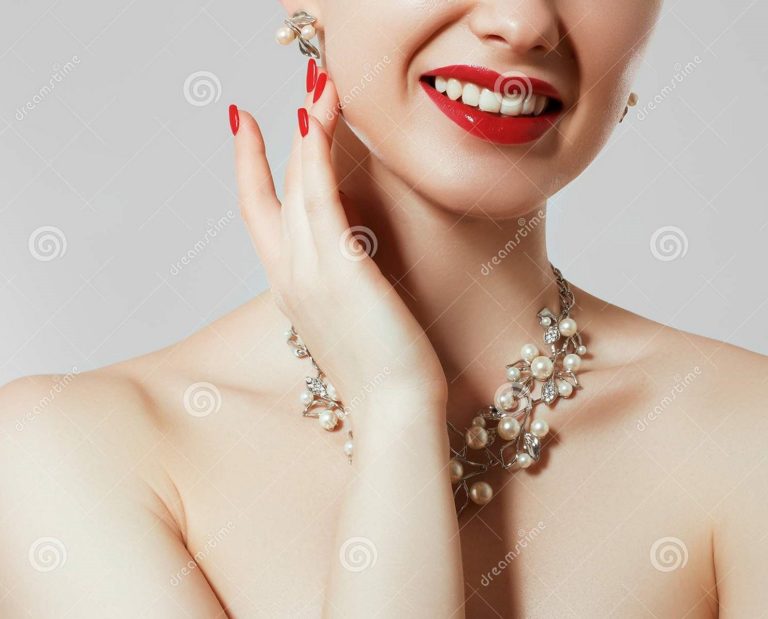 Woman with diamond necklace.