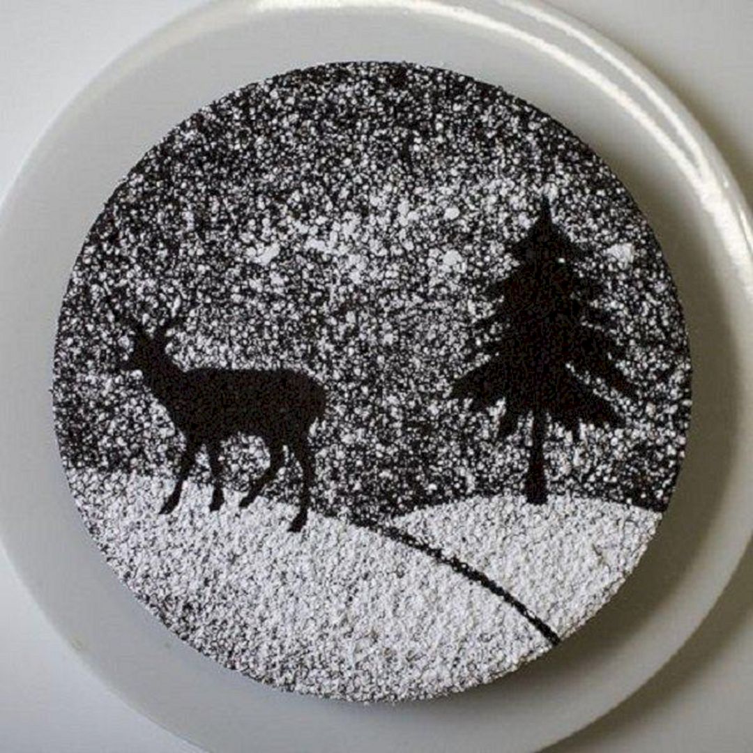 Beautiful looking christmas cake with a silhouette design from cuded