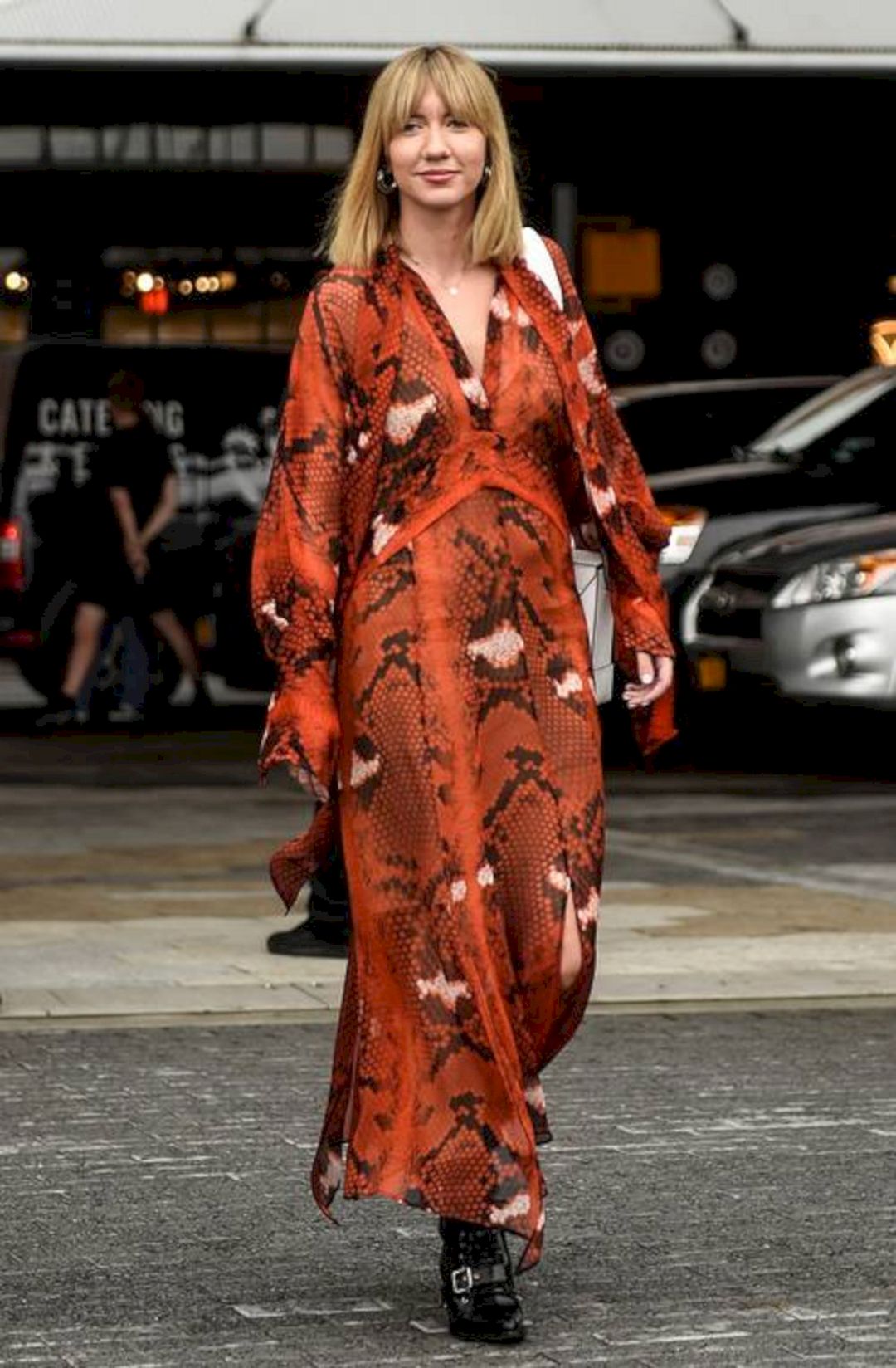 Lisa aiken's red snake print dress from whowhatwear